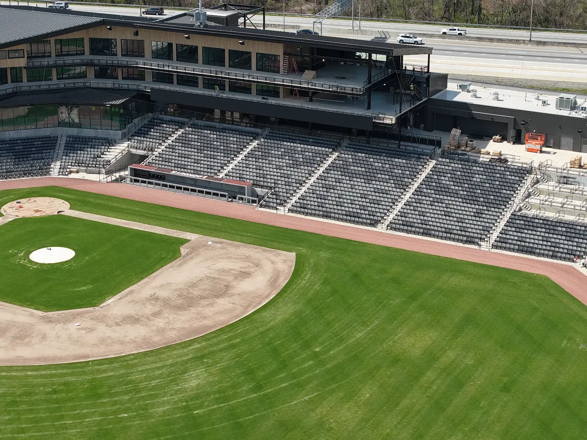 Aerial shot of an empty baseball stadium in Chattanooga, Tennessee during daytime.